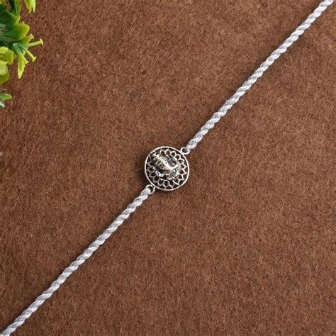 Silver Vighnaharta Ganesha Rakhi – Antique Silver Strike