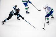 Utah Hockey Club beats Vancouver Canucks 2-1 – Deseret News