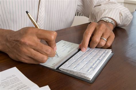 Person Writing A Check