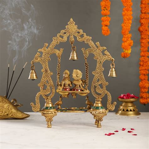 Brass Radha Krishna Swing Three Diyas Stone 13.5 Inch | Budhshiv.com
