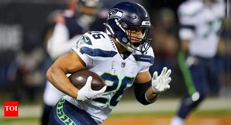 NFL star Zach Charbonnet's net worth in 2025: Current salary, rookie ...