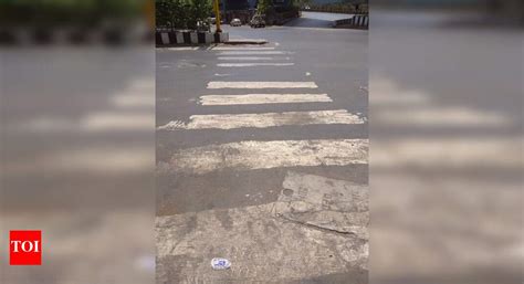 Disappearing of Zebra crossing lines - Times of India