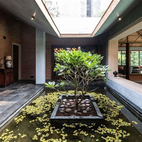 A minimal design scheme unfolds inside this charming penthouse in ...