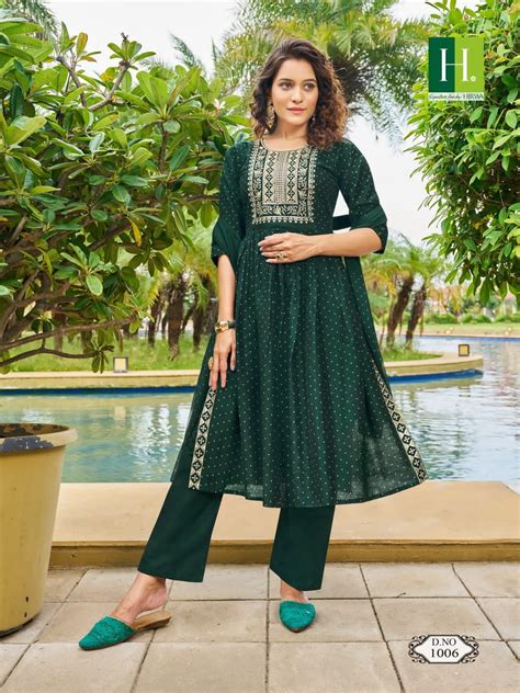 HIRWA PRESENT SINDOOR FESTIVE WEAR NAYRA CUT KURTI WITH PANT AND ...