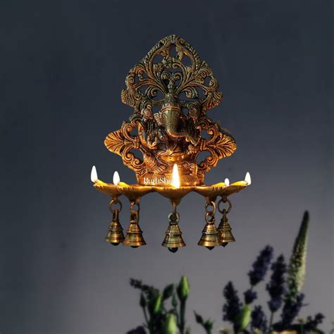Buy Ganesha Brass Panchdeep with bells oil lamp for wall - Budhshiv.com