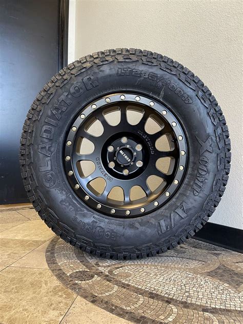 Wheel & Tire Package Method MR305 17X8.5 5X127 Black Wheels & 285-70R17 ...