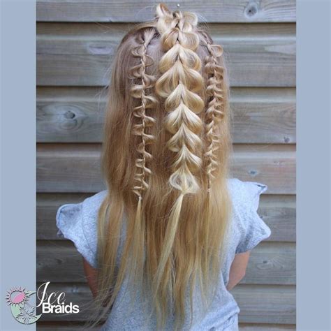 Half-up pull-through with uneven braids. Luna wanted 2 different uneven ...