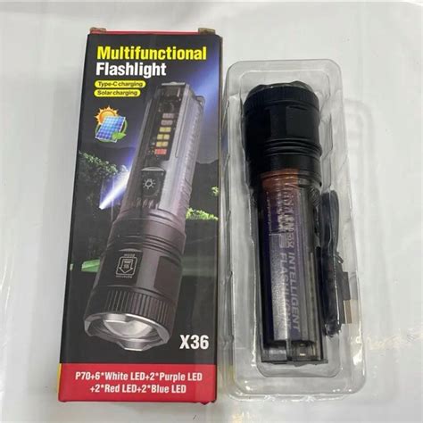 مصباح كشاف متعدد الوظائف X36 شفاف مع شاحن شمسي من نوع C