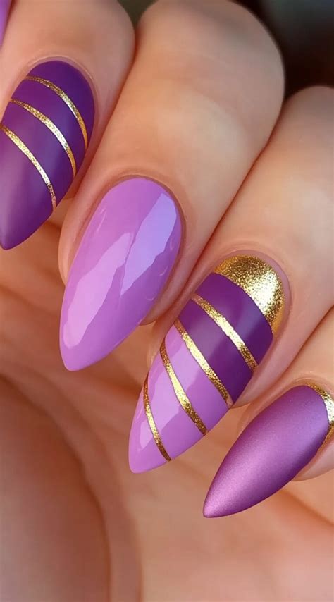 https://huesthetic.com/wp-content/uploads/two-tone-purple-nails-with-gold-stripe-accents-768x1385.jpg