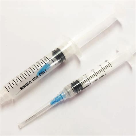 Image result for Retractable Needle Syringe