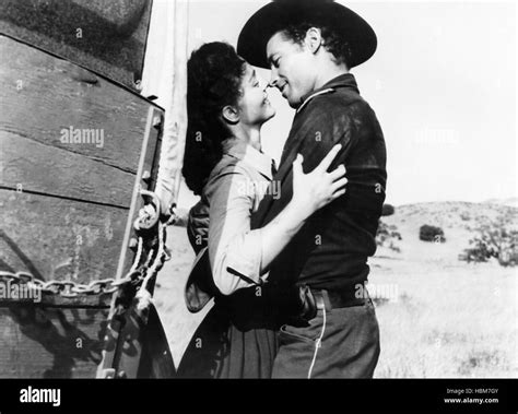 THE COMMAND, Joan Weldon, Guy Madison, 1954 Stock Photo - Alamy