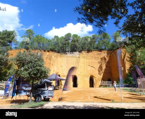 Wind-Kissed Flags with Motion Effect at Bruoux Mines Entrance, Vaucluse ...