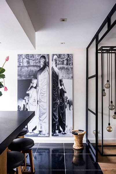 Panel 2 of a diptych Monks watch as young elephants are washed by ...