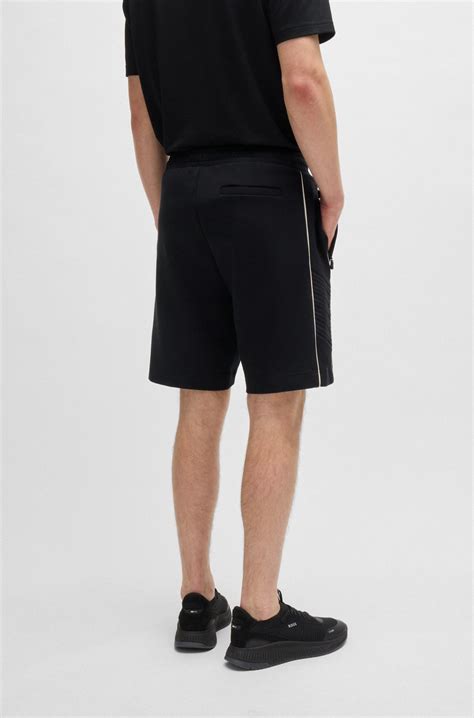 BOSS - Stretch-cotton shorts with embossed artwork - Black