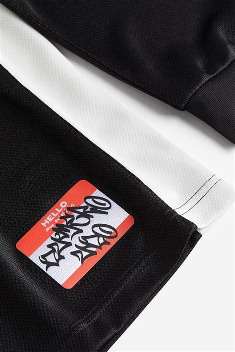 Oversized Fit Long-sleeved mesh top - Black/Harlem - Men | H&M IN