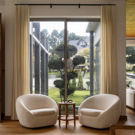 11 mud houses and rammed earth buildings that honour their surroundings ...