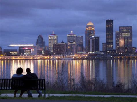 Workmen install a wind turbine - March 17, 2011 | The Economic Times