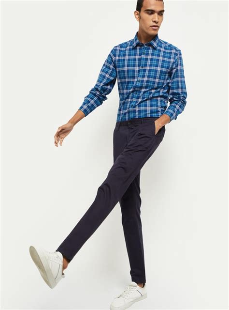 Buy Men Solid Skinny Fit Chinos Online at just Rs. 1299.0 ...