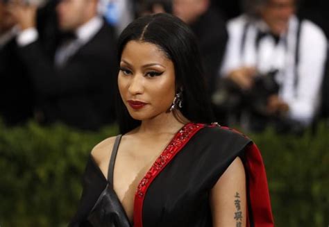 Nicki Minaj flaunts her curves in a red number as her beef with Remy Ma ...
