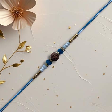 Traditional Rudraksha Rakhi with Light Blue Thread – Rakhi Store