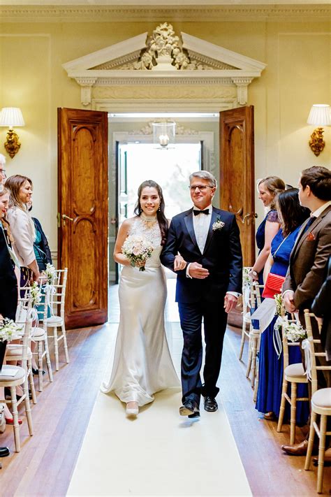 Bride walking down the aisle for a civil ceremony at Hedsor House ...