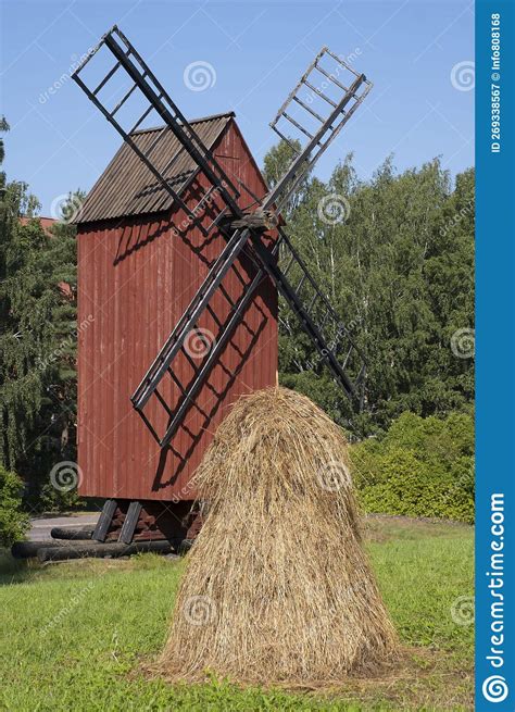 Old Red Wooden Windmill with a Haystack in the Foreground. Finnish Agriculture Stock Image ...