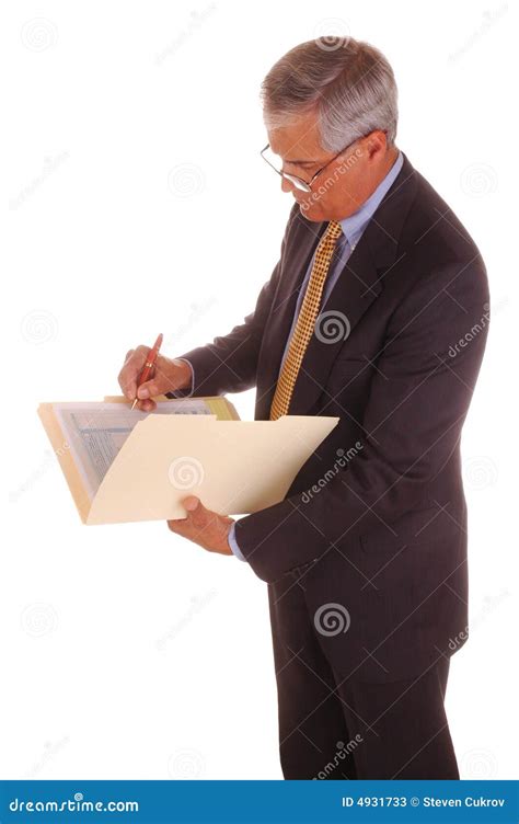 Middle Aged Businessman Writing in Folder Stock Image - Image of ...