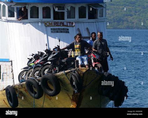 Maumere, Indonesia-May 23, 2023: An inter-island ferry in Indonesia is sailing from the port of ...