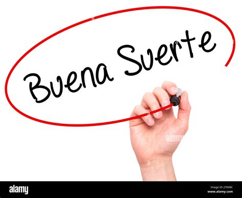 Man Hand writing Buena Suerte( Good Luck in Spanish) with black marker ...
