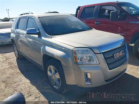 Report 2GKFLTE34F6302353 GMC TERRAIN 2015 Beige Gasoline - price and damage history