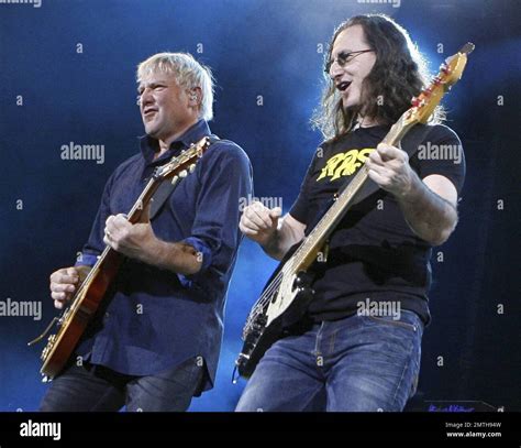 Legendary rock band Rush perform live at Cruzan Amphitheatre where lead ...