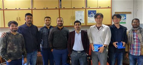 A group of men posing for a photoDescription automatically generated