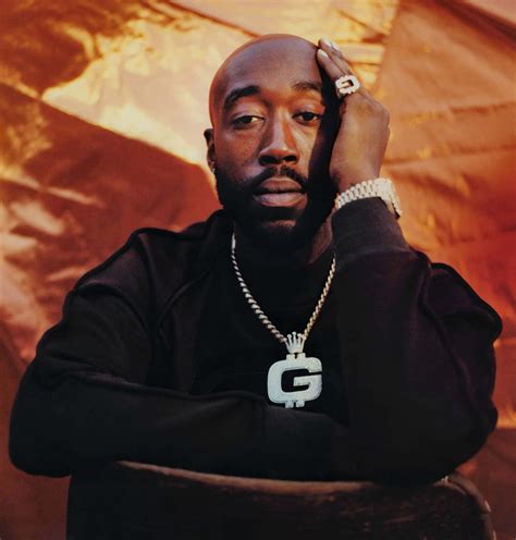Download Freddie Gibbs Portraitwith Gold Chain Wallpaper | Wallpapers.com