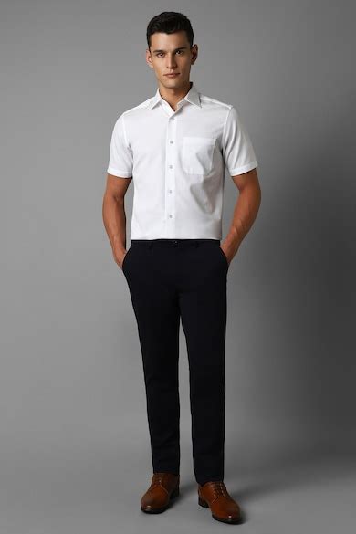 Buy Men Black Slim Tapered Fit Solid Flat Front Formal Trousers Online ...