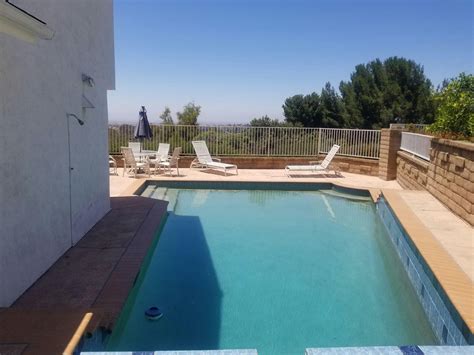 Large pool with beautiful views of mountains and city of Irvine all the way to Los Angeles ...