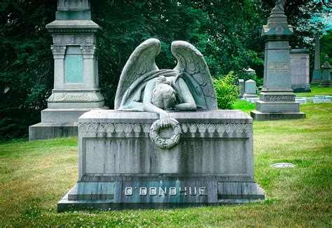 Weeping Angel statue at Greenwood Cemetery • The Showbear Family Circus | Cemetery statues ...