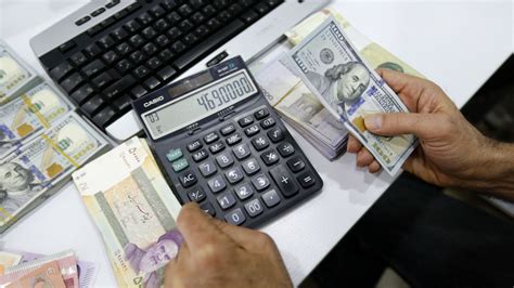 Iran's currency hits new record low against the dollar