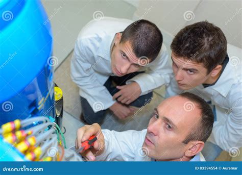 Image result for An Engineer Fixing Machine