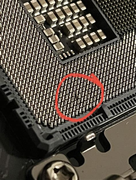 Is this pins bent on my motherboard and if so will it be ok? : r/intel