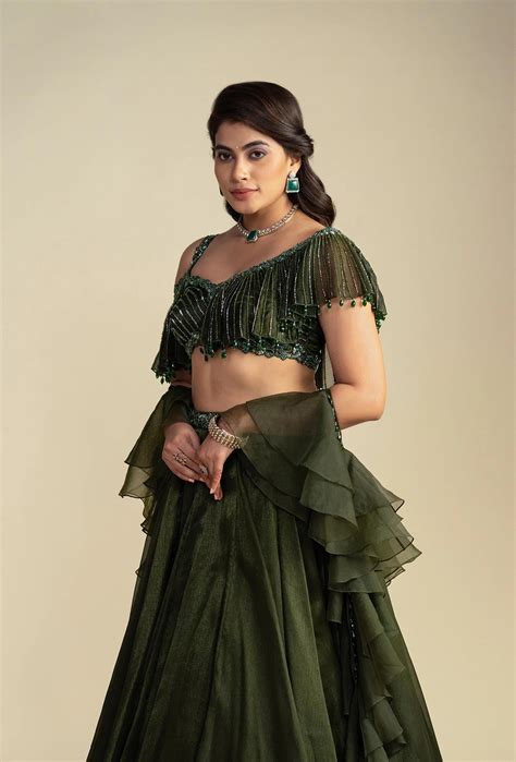 Pine Dark Olive Green Asymmetrical Ruffled Blouse Lehenga Set | Tajore