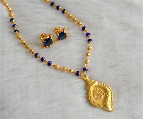 Gold tone 24 inches blue beaded chain with shanku om pendant set dj-46 ...