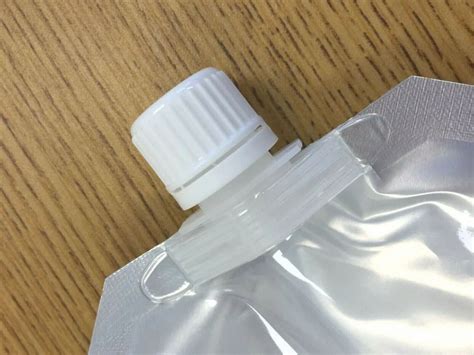 Packaging Pouches - Pouch With Cap Manufacturer from Bengaluru