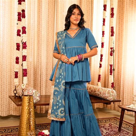 Solid Blue Tiered Peplum Short Kurta with Tiered Sharara and Printed D ...