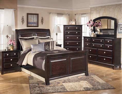Ridgley Sleigh Bedroom Set from Ashley (B520) | Coleman Furniture