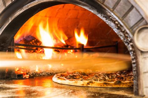Premium Photo | Wood Fired Traditional Pizza Oven Pizza Restaurant ...
