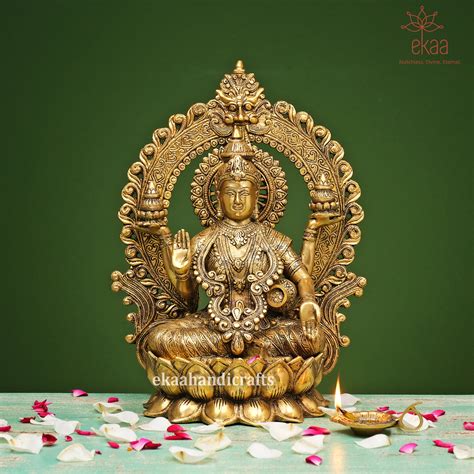 Brass Goddess Lakshmi Statue with Arch for Home Temple – Ekaa Handicrafts