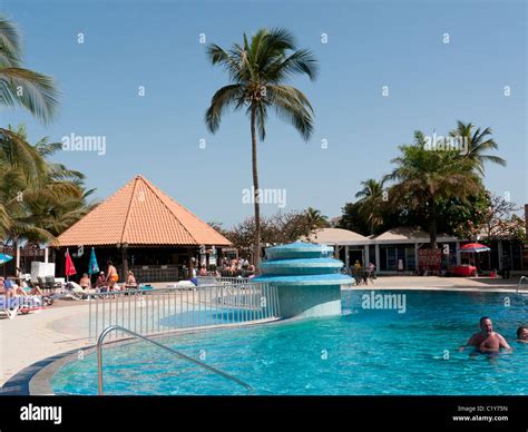 The pool area and sunbeds of the Atlantic Hotel in Banjul, The Gambia ...