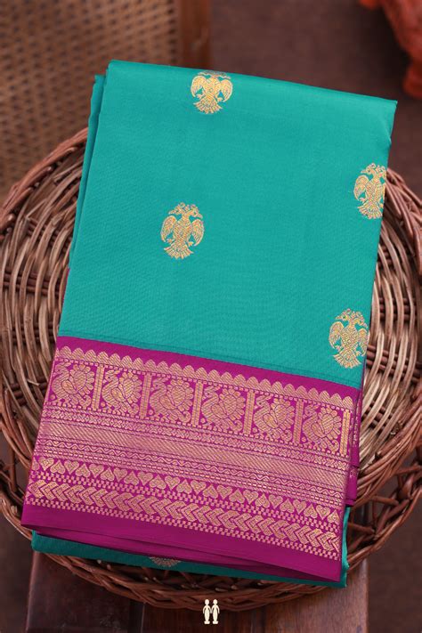 Kanchipuram Silk Saree In Peacock Blue With Iruthalai Pakshi