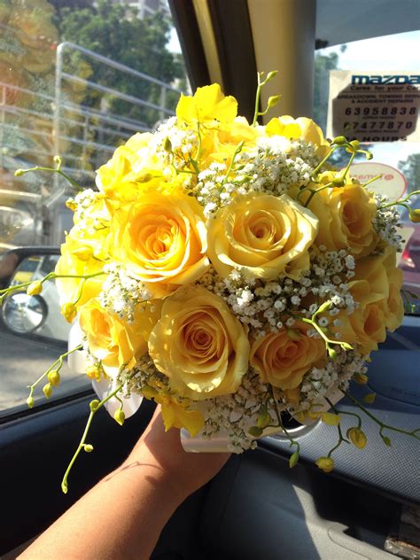 Yellow roses, baby's breath & dancing lady orchid bridal bouquet For ...