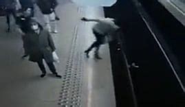 Watch video: Man pushes lady passenger in front of train at Brussels